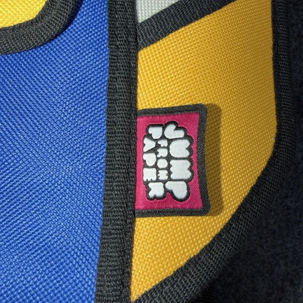 JumpFromPaper 2D Cartoon Backpack Blue‎ Yellow White Comic Optical Illusion Bag